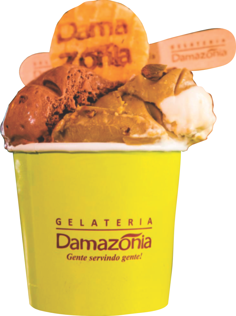 A yellow tub of Damazonia gelato piled with scoops and branded wooden spoons